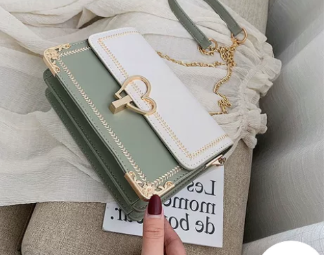 新加坡女包品牌限定爱心包包女士2022官方...