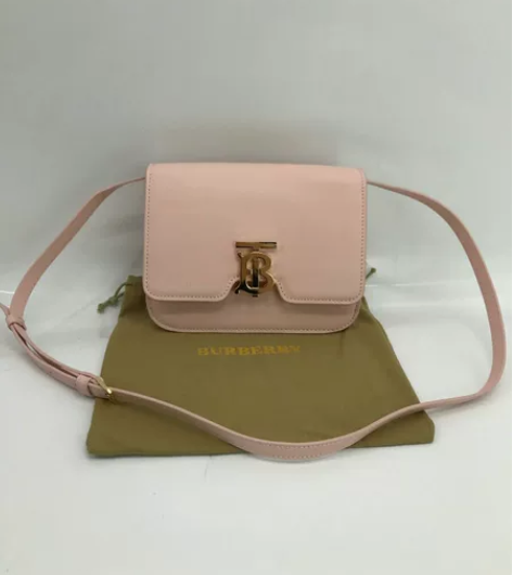 女士斜挎包，手拿包。 锁扣装饰。灵感专属标...