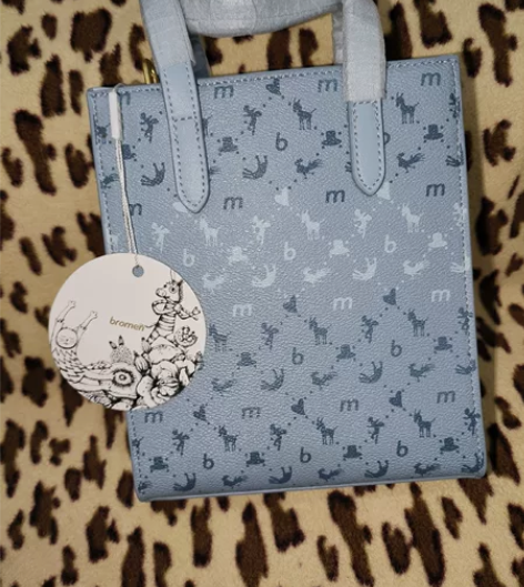 过年不打烊！ 不莱玫蓝色小号手提斜挎琴谱包...