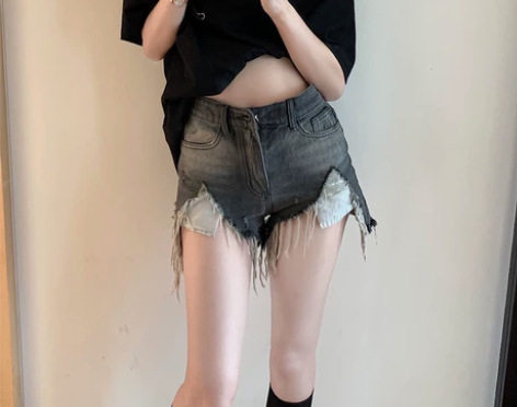 水洗做旧破洞毛边牛仔裤女夏季薄款热裤a字短...