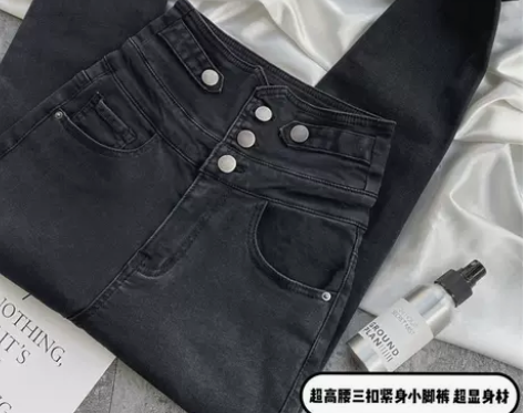 牛仔小脚裤女秋冬新款黑色加绒超高腰多扣显瘦...
