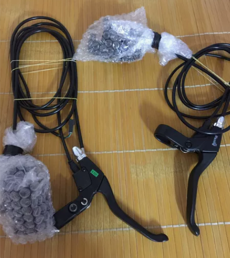 16寸电动自行车改装油刹拆下来的都没有使用...