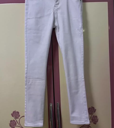 出售罗米娜女士秋冬季新款白色加绒加厚牛仔铅...