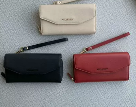 意大利V牌女士手拿包手拎钱包 全新黑色的。...