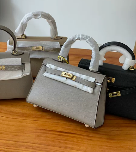 全新头层牛皮凯莉包亏本处理精致斜挎手拎小包...