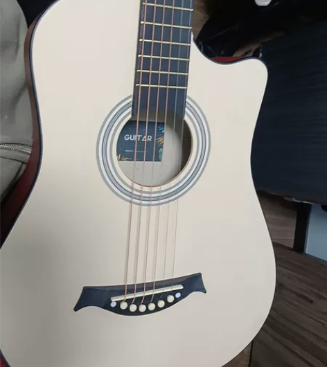 原木单板民谣吉他,想自学冲动买的,买来不会...