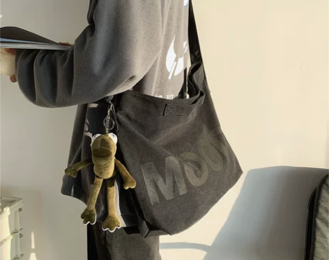 帆布包男斜挎包大容量单肩包休闲学生背包慵懒...