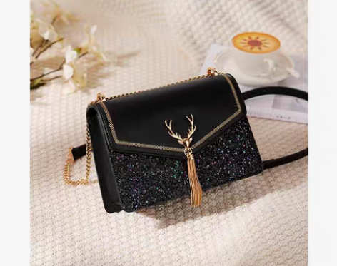 包邮欧时纳包包女2022新款星空流苏单肩链...