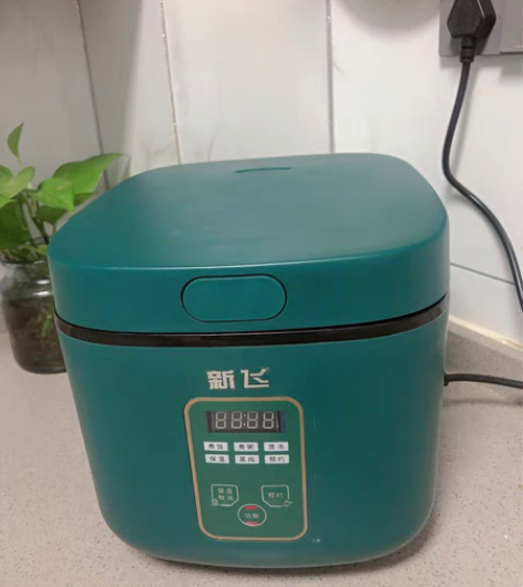 包邮全新新飞智能迷你电饭煲家用一个人2人多...
