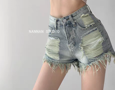 转卖美式街头做旧磨破毛边牛仔短裤女夏季辣妹...