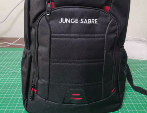 包邮（清库存）军刀双肩包男士背包大容量高中...