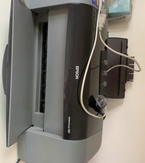 爱普生C67，很多年没用，换了盒墨水想试试...