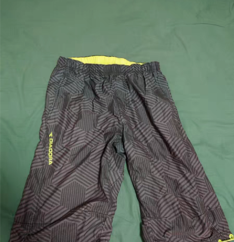 包邮Diadora 迪亚多纳运动裤中裤过膝...