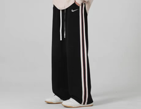 转卖奥特莱斯撤柜侧边拼接运动裤男秋季新款宽...