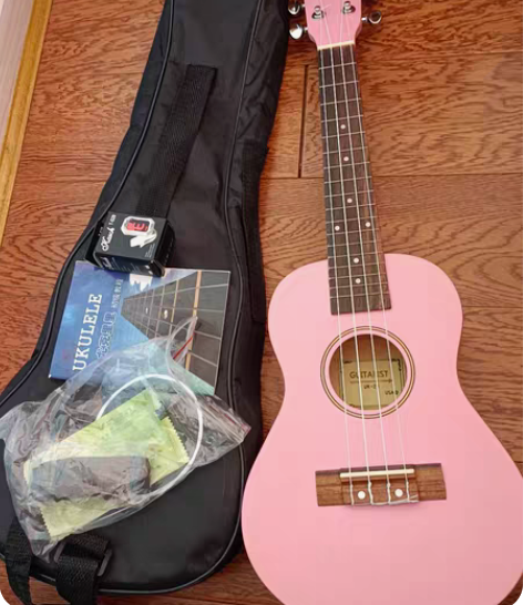 尤克里里的吉他特别好  可爱的粉红色  希...