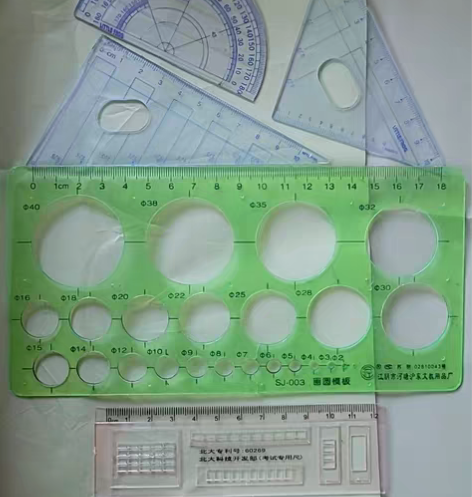 闲置办公学习用品，订书机尺子等。图1各种尺...