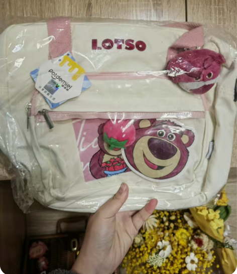 正版迪士尼草莓熊毛绒手提双肩包大容量包 新...