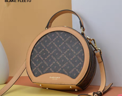 包邮啄木鸟圆形女包2022新款时尚斜挎小圆...