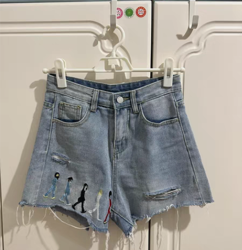 蓝色破洞牛仔裤女装春季新款高腰显瘦甜辣超短...