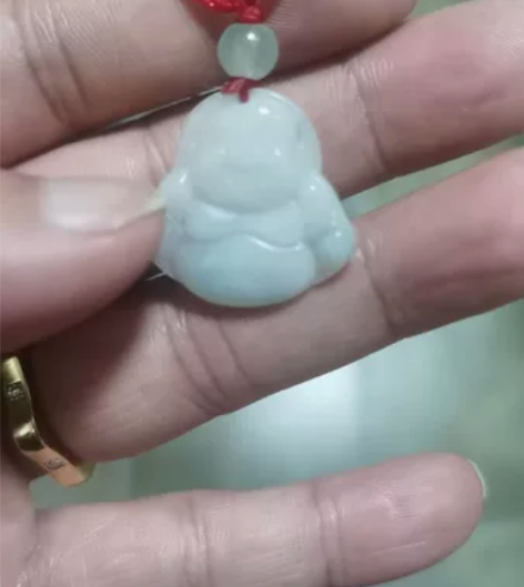 翡翠弥乐飘一点点绿，有点薄！保真！非假不退...