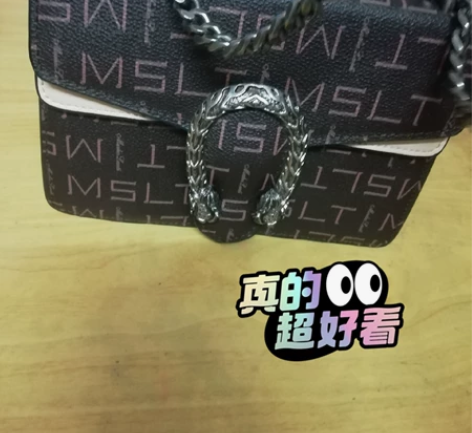 寇一品牌,酒神款,五金是乌金枪色,链条很厚...