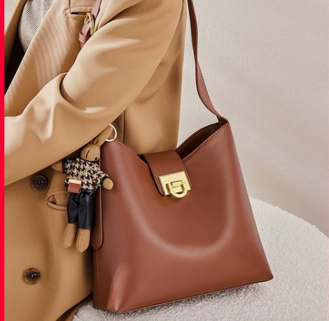 全新 纳兰杜棕色真皮水桶包 女斜挎包单肩包...