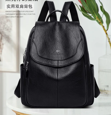 特价袋鼠正品真软皮女包2021新款双肩包女...