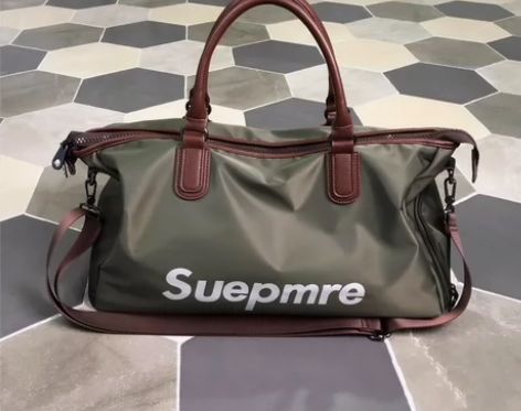 （不满意包退）网红旅行包男手提短途出差旅游...