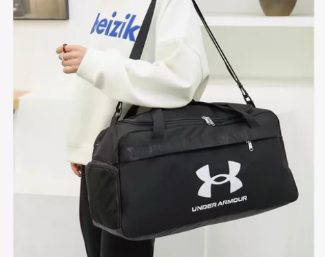 安德玛UA 男女学生训练运动旅行手提包单肩...