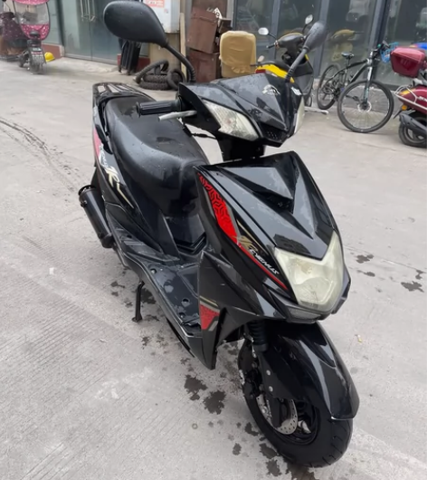 21踏板坤豪牌 几千公里一手。成色如图18...