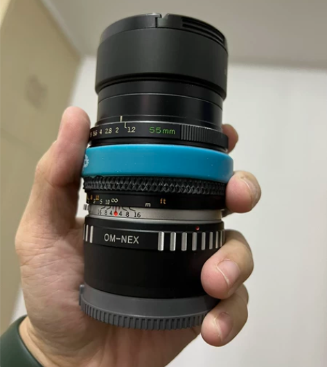 奥林巴斯om55 1.2 银嘴 鱼鳞焦外镜...