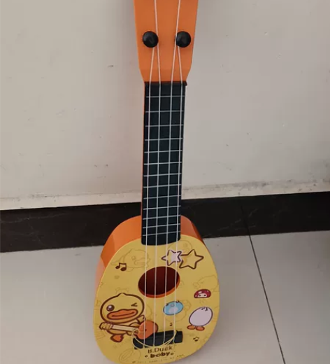 转让儿童玩具乐器一把，长度约43cm，孩子...