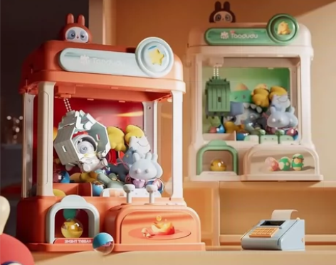 儿童抓娃娃机网红夹公仔糖果机投币式扭蛋机男...