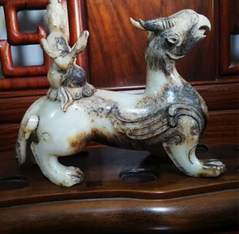 和田白玉菩萨骑凤摆件，玉质油润，雕工精美，...