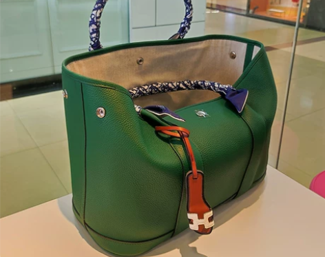 大方得体！墨绿色包包togo头层牛皮花园手...