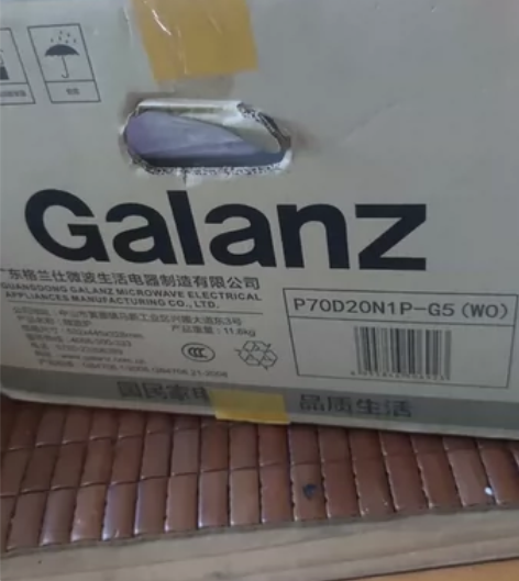 全新格兰仕光波炉，公司年会奖品 感兴趣的话...