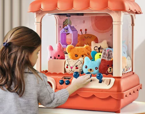 儿童抓娃娃机小型家用迷你夹公仔机投币扭蛋糖...